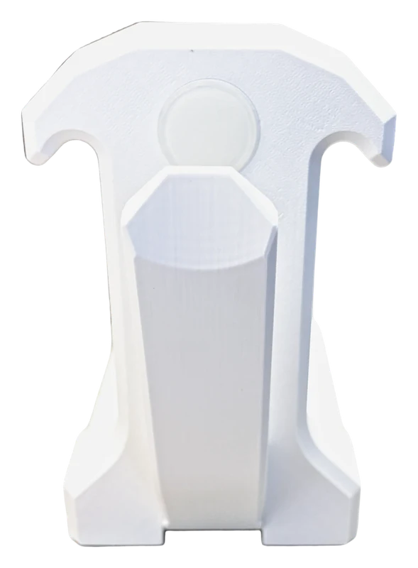 The back of the Cuffez head in White, showing the round disc on the rear face.